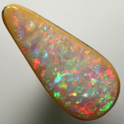 SOLID BOULDER OPAL Sparkling red, green and purpl fire. SEE VIDEO